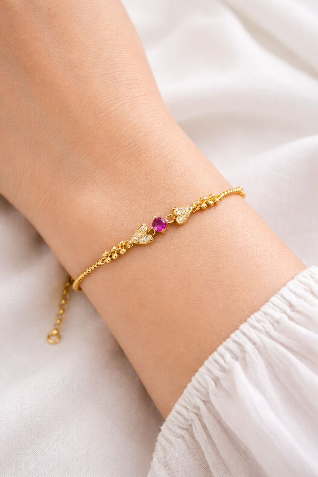 Elegant Gold Floral Bracelet with Pink Stone & Leaf Motif