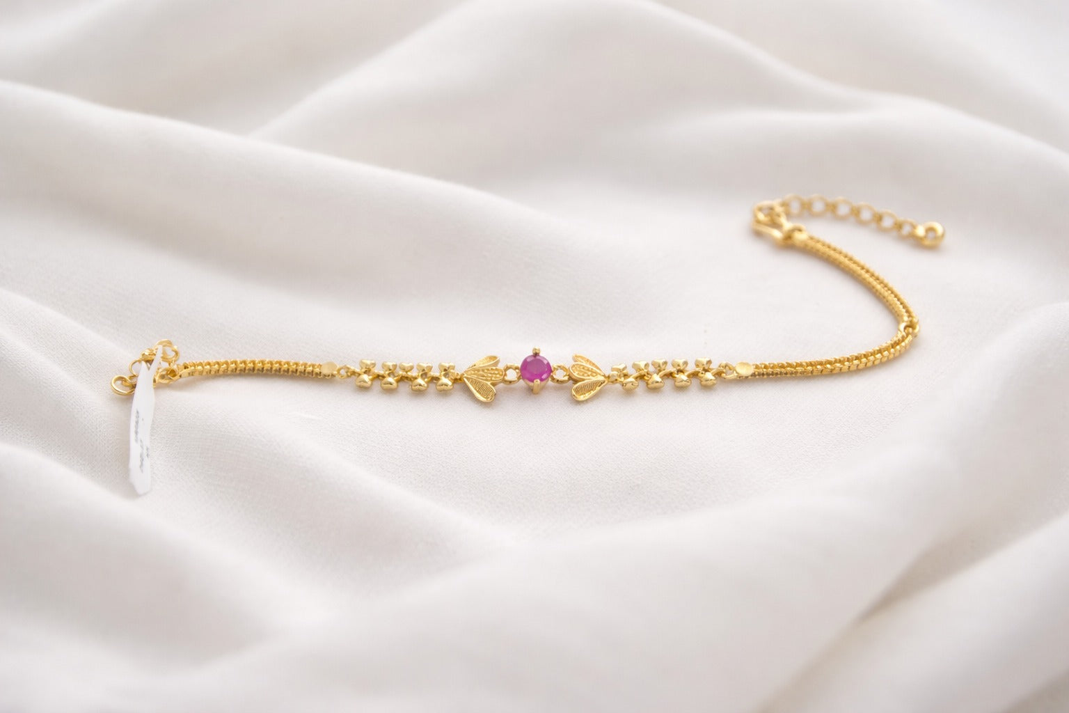Elegant Gold Floral Bracelet with Pink Stone & Leaf Motif