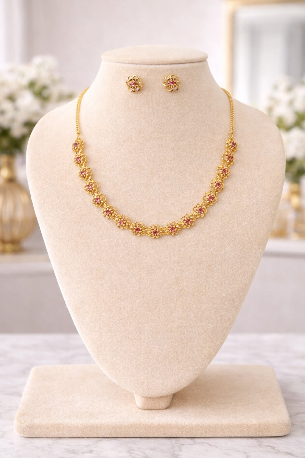 Elegant Floral Gold Necklace Set with Ruby Accents