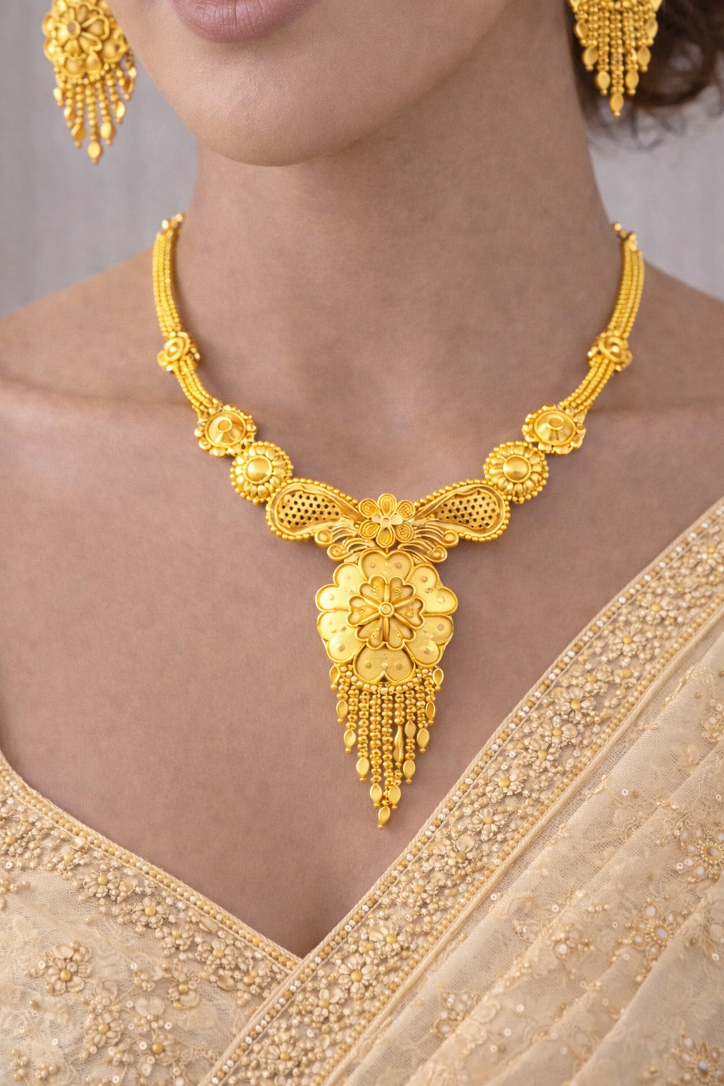 Regal Floral Gold Elegance Necklace Set with Statement Pendant & Drop Earrings