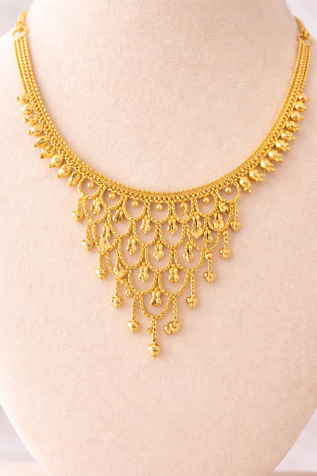 Regal Cascade Gold Necklace Set with Layered Dangling Charms & Matching Earrings