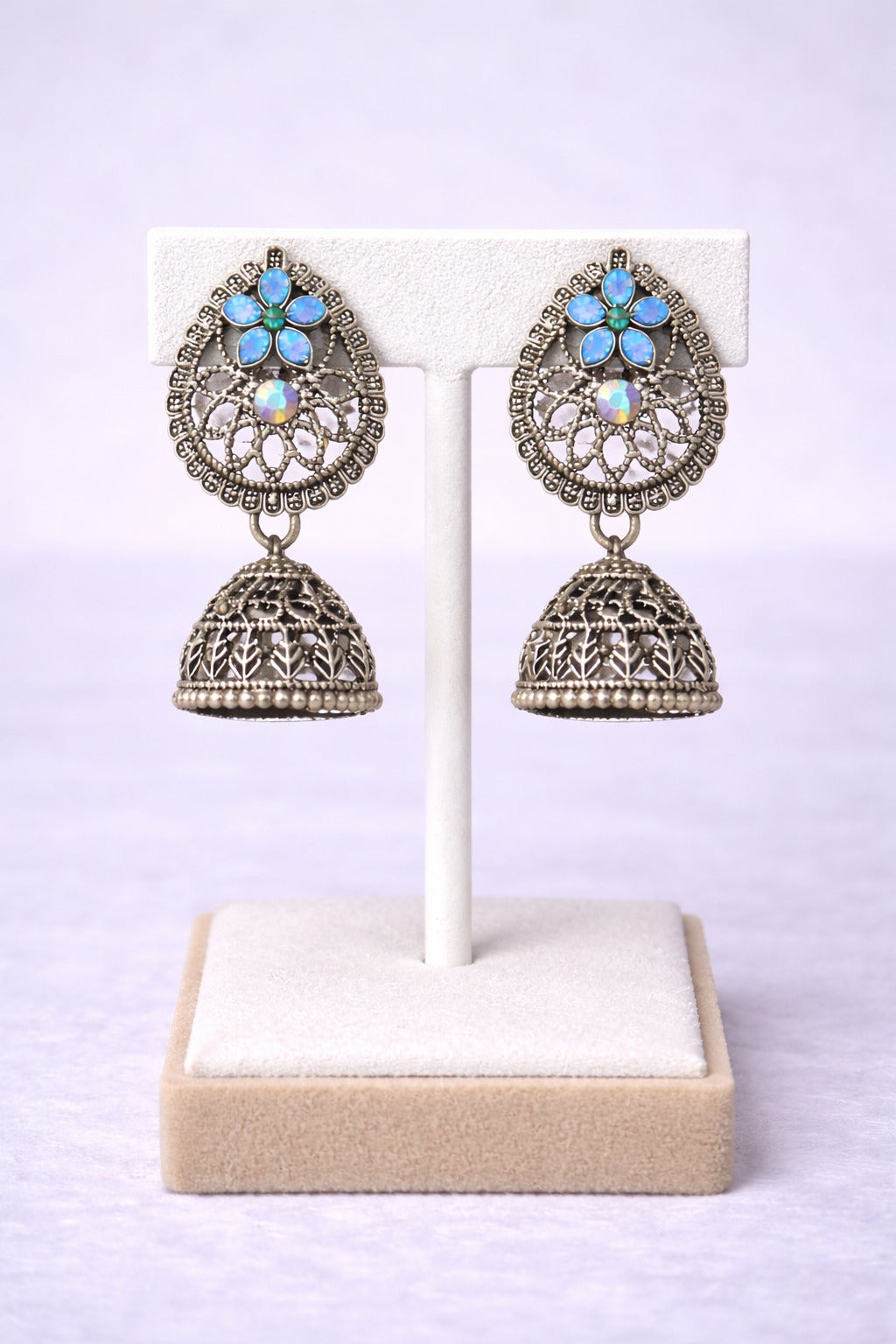 Oxidized Silver Floral Jhumka Earrings with Blue Stone & Crystal Accent