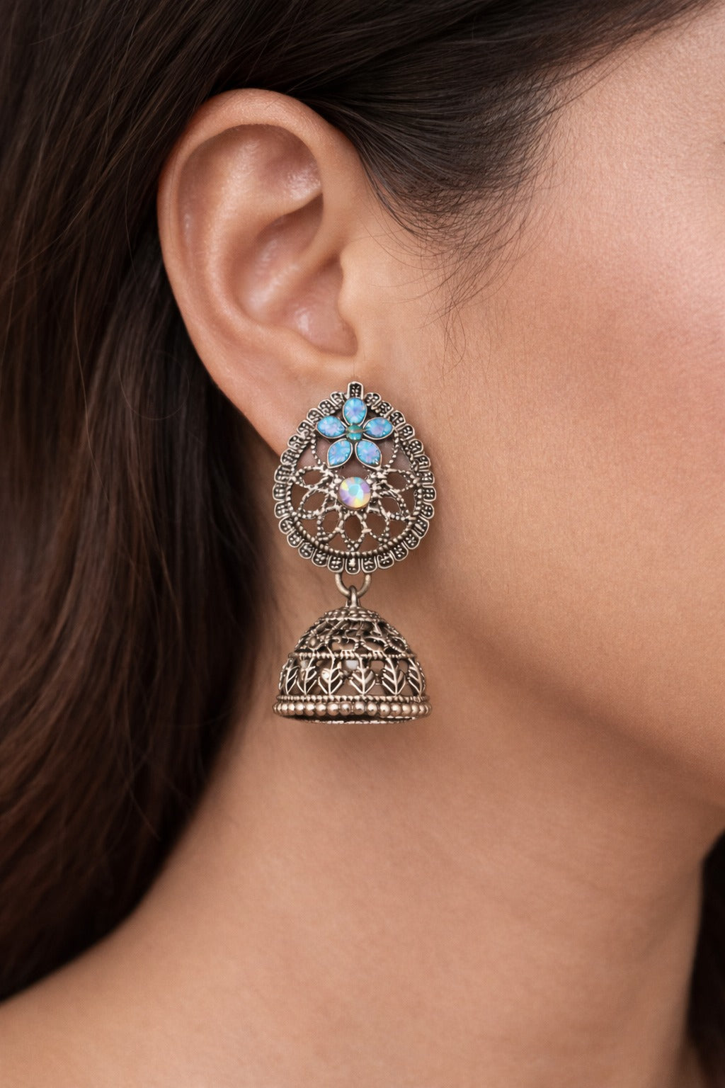 Oxidized Silver Floral Jhumka Earrings with Blue Stone & Crystal Accent