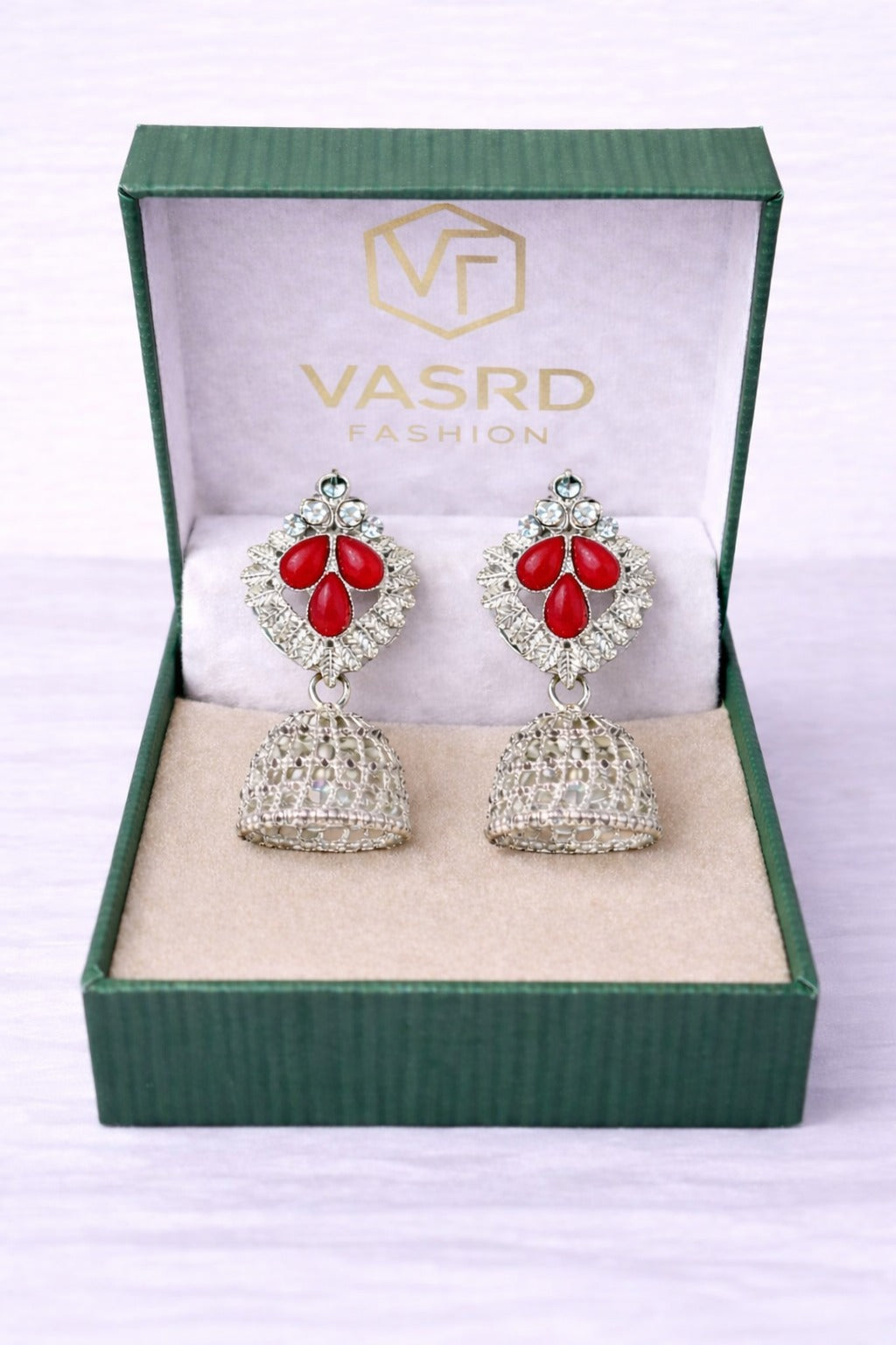 Silver Filigree Jhumka Earrings with Red Stone Accent